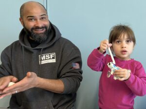 Hot Shots Creativity Club dad and daughter doing sculpture