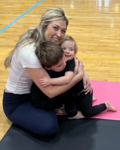 A Hot Shots mom and her son and daughter taking a break from Acro-Dance